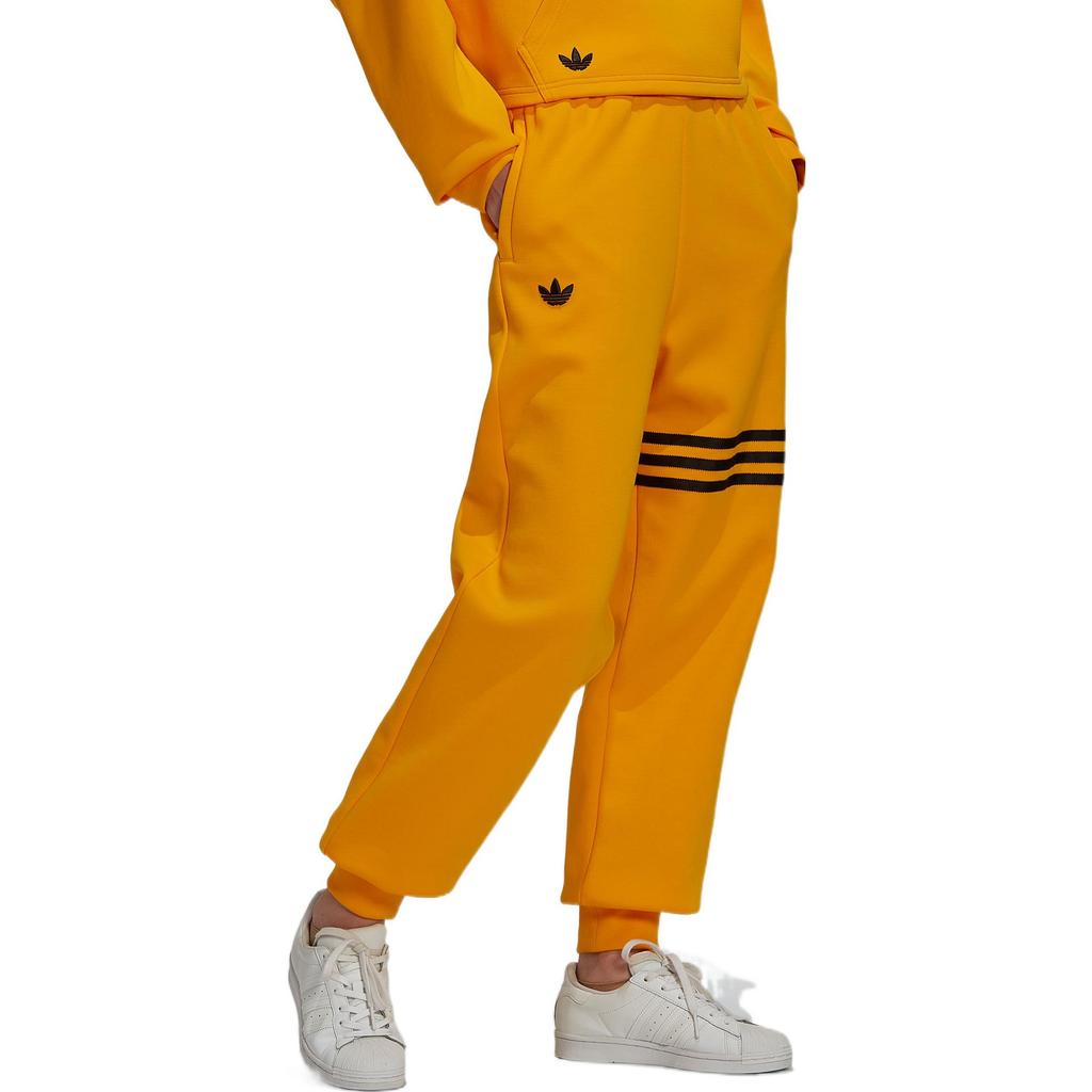 Adidas Originals Трилистник Сплошной цвет в полоску Джоггеры Женские брюки Желтый HM1763