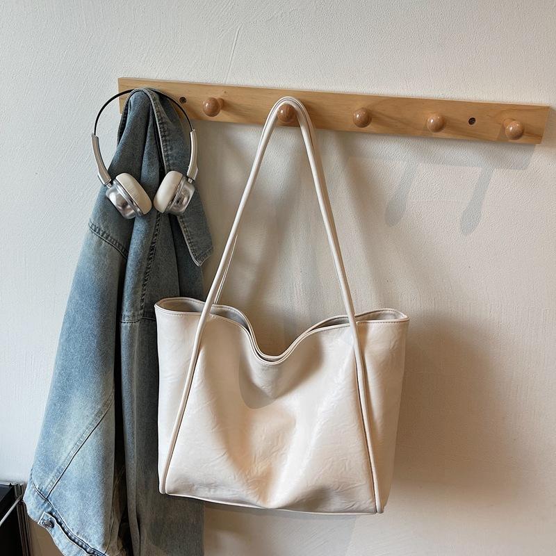 Bag Women's New Soft Leather Tote Bag Large Capacity Women's Niche High-end Sense of Commuting To Work Portable Shoulder Bag