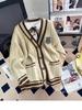 Женский вязаный кардиган средней длины в студенческом стиле - Коллекция Осень/Зима 2025