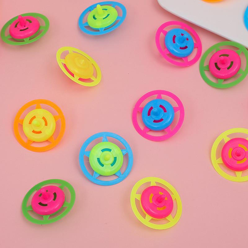 Plastic Spin Gyroscope Toy For Children With Colorful Candy Design And Traditional Play Use