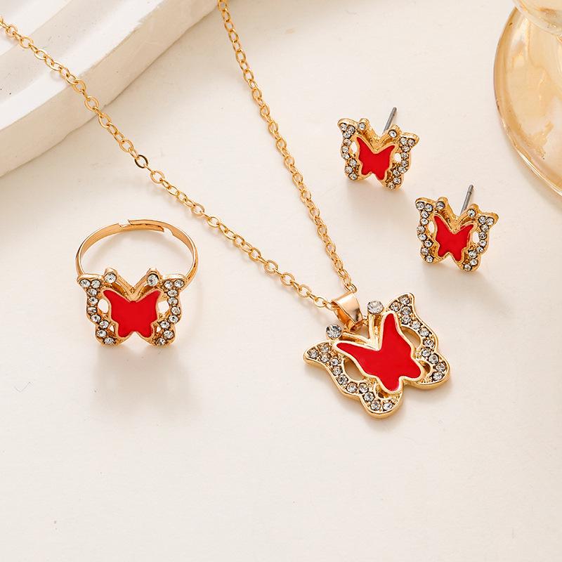 Shein Trendy Butterfly Jewelry Set: High-End Diamond Hollow Necklace, Ring & Earrings for Women - European & American Fashion.