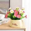 Living Room Decor: Artificial Sunflower and Green Plant Arrangements, Small Potted Plants, and Plastic Bouquets