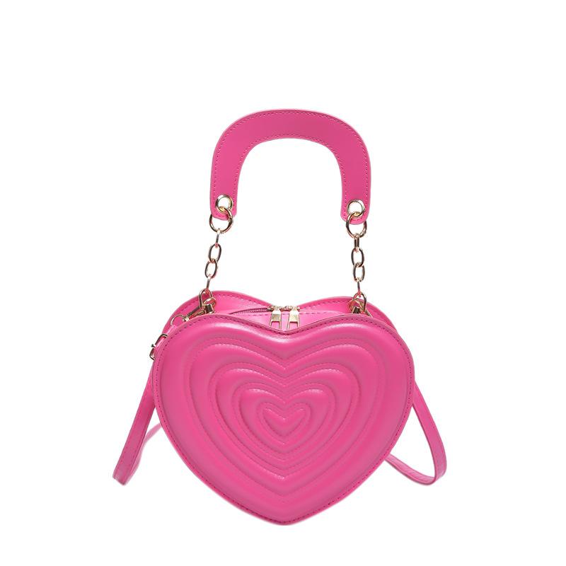 Сумка с углублениями 2024 года, новая модная сумка в форме сердца, милая модная сумка через плечо, однотонная сумка в форме сердца для девочек