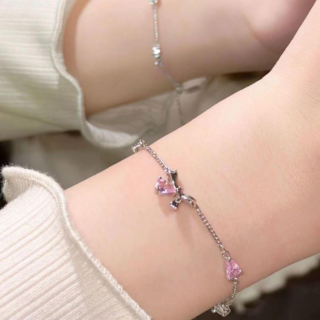 Изысканный браслет-бантик из розового циркония - новый дизайн ювелирных изделий класса люкс 2025 года