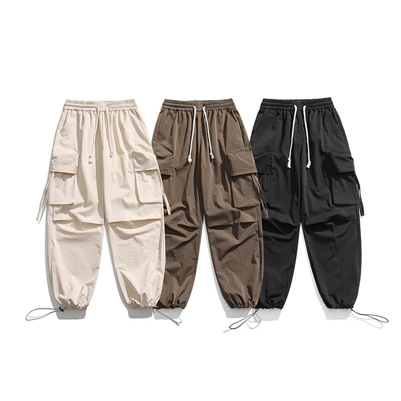Новые свободные брюки-карго-десантники с широкими штанинами, весенние модные брендовые брюки с несколькими карманами для мужчин