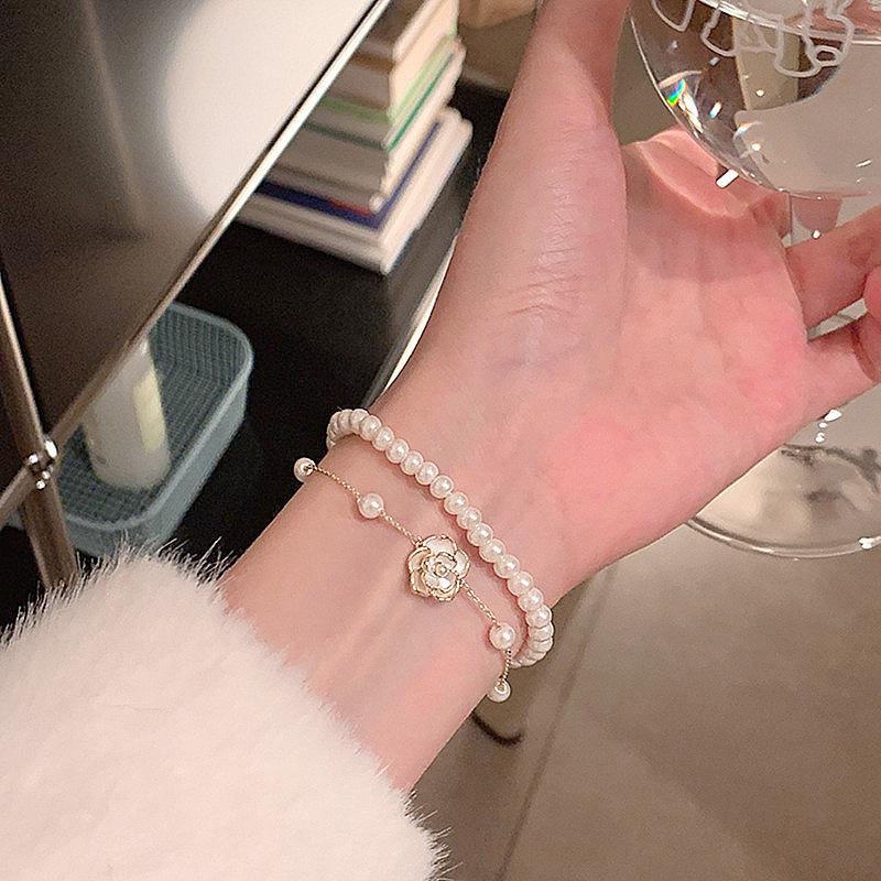 Real gold-plated pearl double-layer oil-drop camellia bracelet, a fashionable and luxurious piece of jewelry with a high-end feel, in a French retro