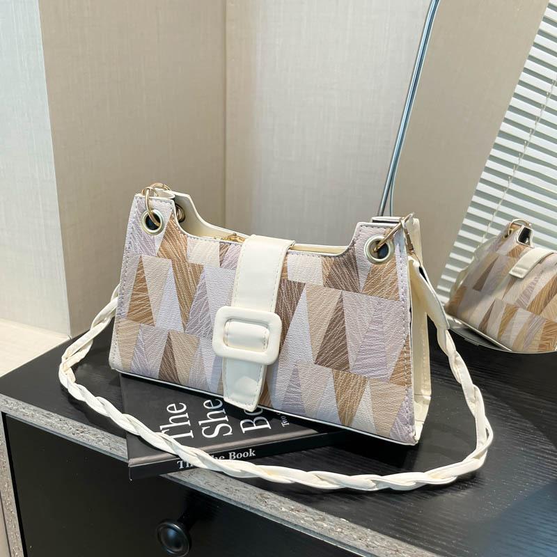 Маленькая сумка высокого класса, женская весна 2025, новая модель, популярный нишевый дизайн этого года, сумка на плечо/подмышку, универсальная сумка-мессенджер