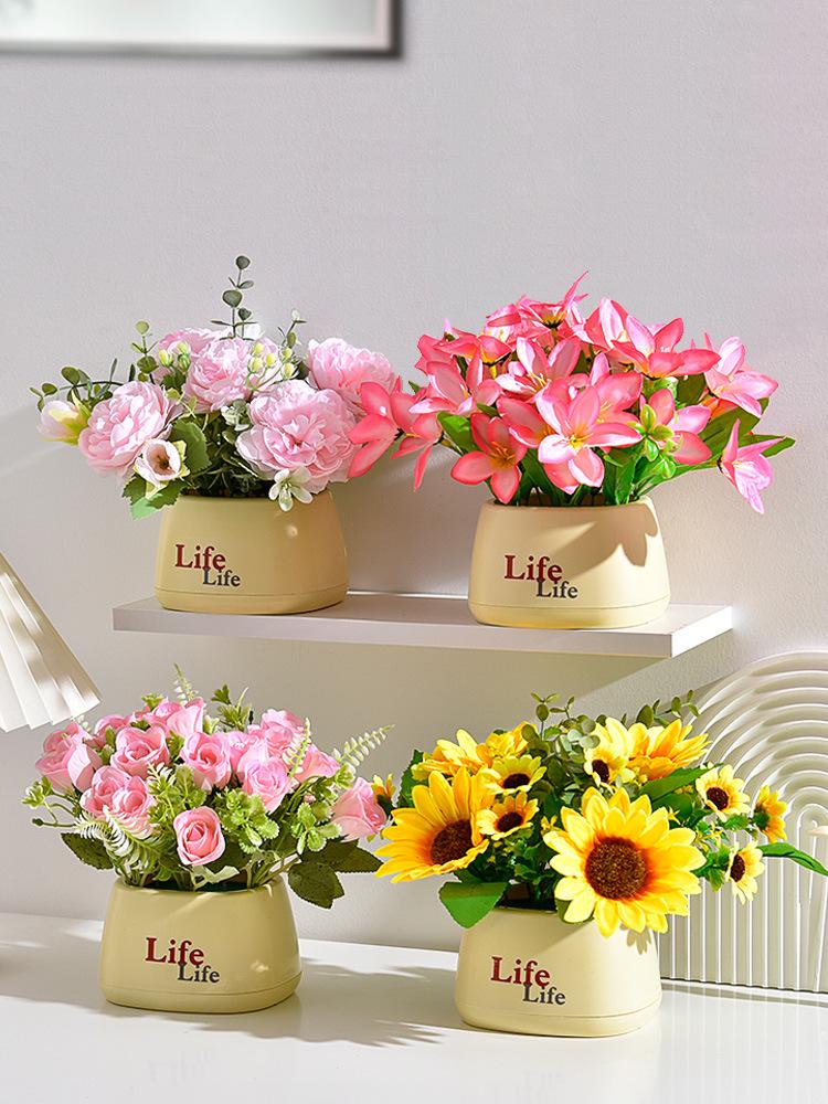 Living Room Decor: Artificial Sunflower and Green Plant Arrangements, Small Potted Plants, and Plastic Bouquets
