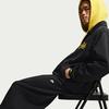 Nike Повседневные брюки мужские черные умеренно зауженные с манжетами
