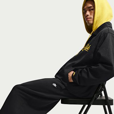 Nike Повседневные брюки мужские черные умеренно зауженные с манжетами