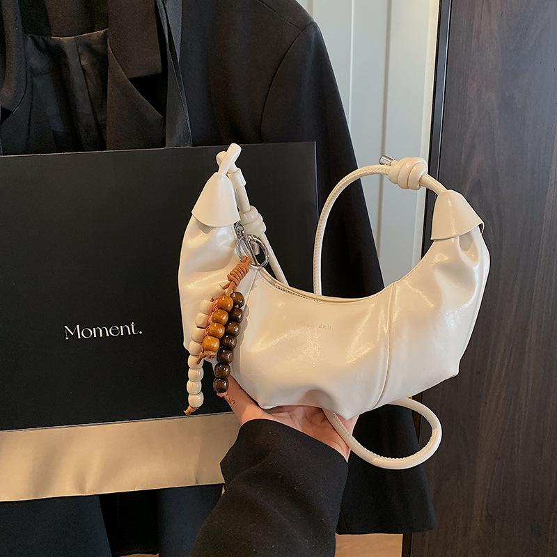 Premium retro dumpling bag women's new fashion casual shoulder messenger bag niche commuter bag