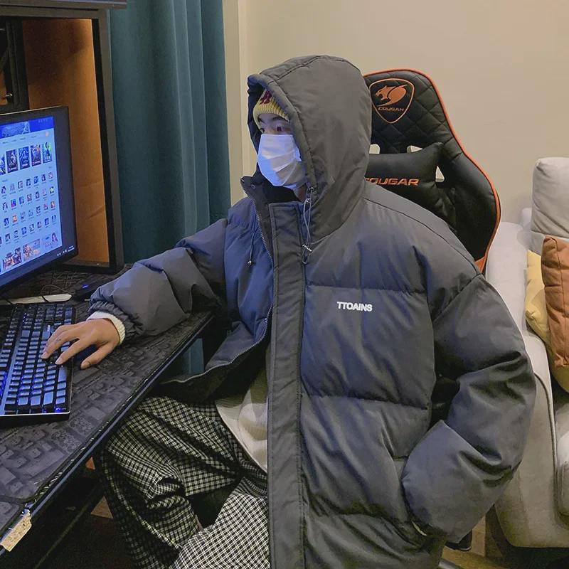 Мужская зимняя хлопковая куртка с капюшоном 2025: Модная, свободного кроя, универсальная плоская куртка в гонконгском стиле.