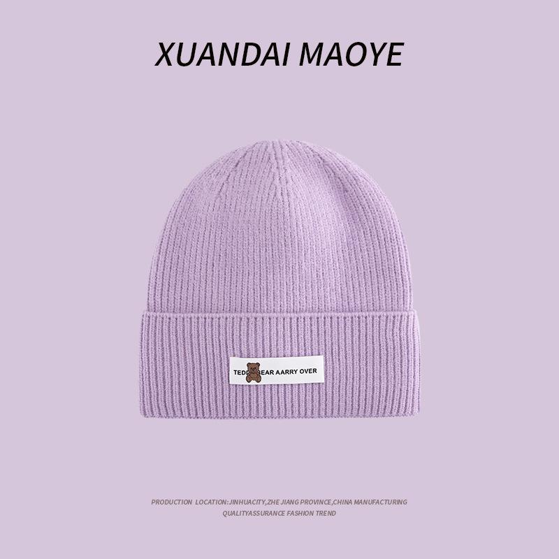 Осенние и зимние шапки женские плюшевые новые вязаные шапки универсальные теплые защитные наушники шерстяные утолщенные модные студенческие шапки