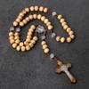 Кофейного цвета ручной вязки деревянное ожерелье-розарий с крестом и деревянными бусинами 9х10 мм