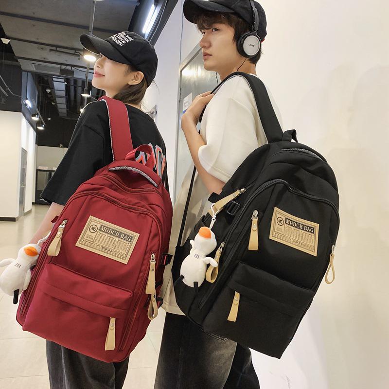 Fashionable Water-Repellent Student Backpack: Trendy High-Capacity Design for Couples