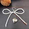 Korean Chic Pearl Bow & Silver Heart Keychain for AirPods and Phones