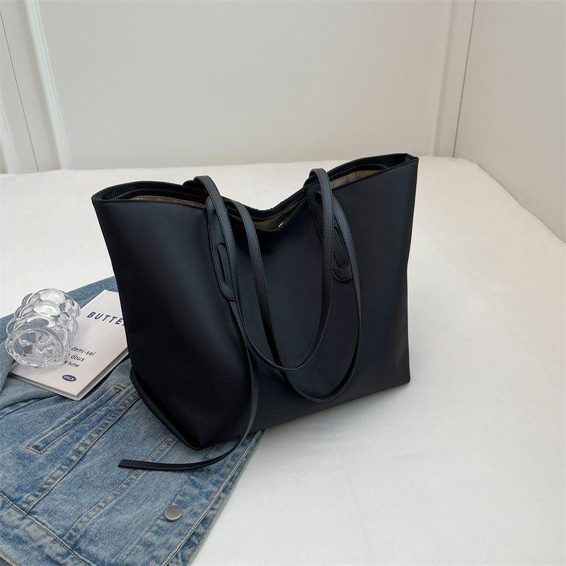 Premium casual tote bag new portable versatile explosive big bag fashionable commuter shoulder women's bag