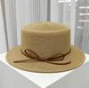 Seaside vacation idyllic style flat-brimmed bow women's summer travel sunshade sunscreen hat, straw-woven elegant top hat