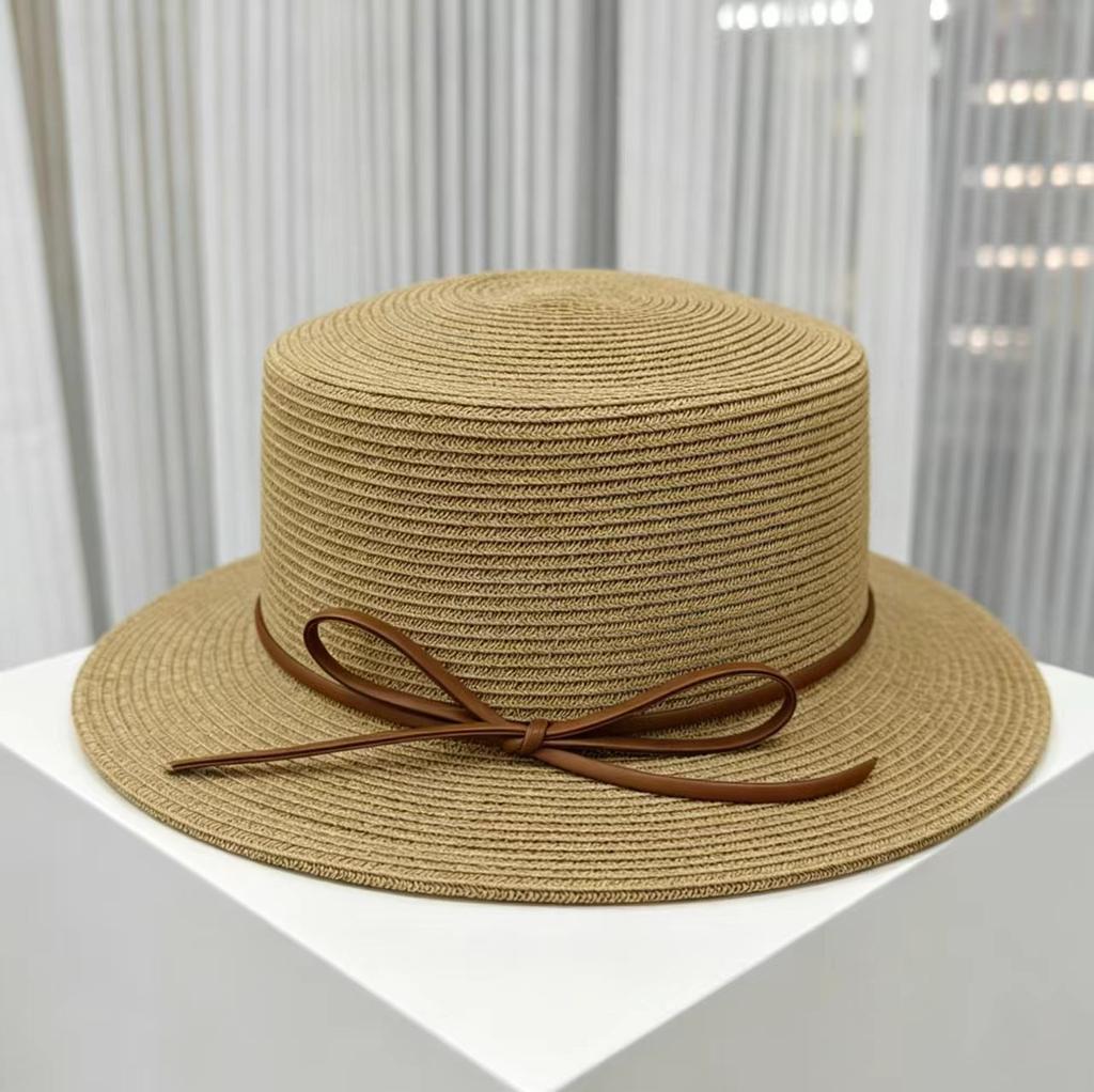 Seaside vacation idyllic style flat-brimmed bow women's summer travel sunshade sunscreen hat, straw-woven elegant top hat