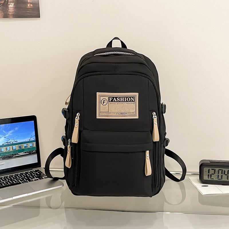 Fashionable Water-Repellent Student Backpack: Trendy High-Capacity Design for Couples