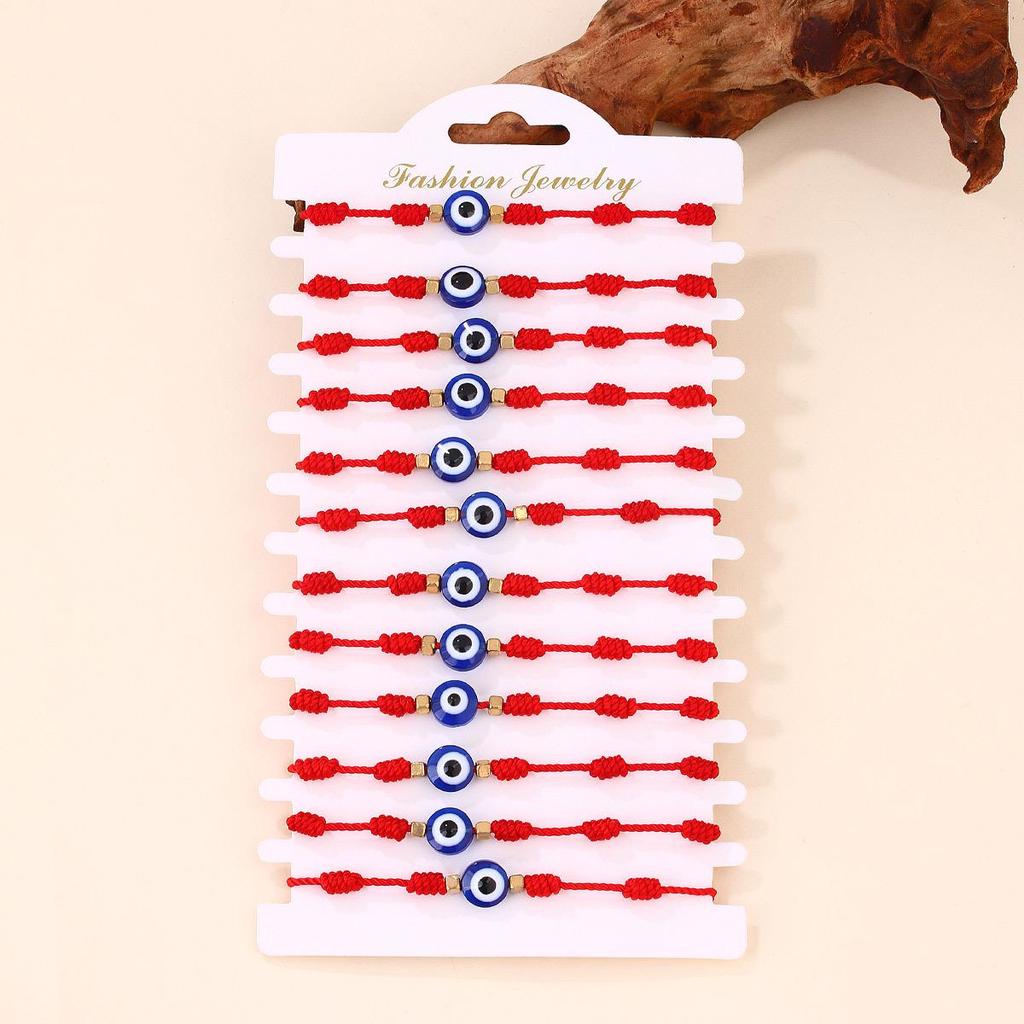 Набор браслетов из красной нити с синим сглазом - Ручная работа, плетеный дизайн