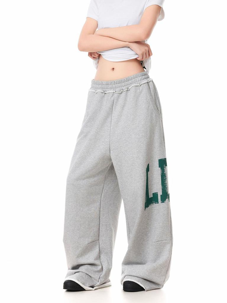 Женские спортивные брюки в американском ретро-стиле с принтом боковых букв - Длина до пола, Свободный крой, Эластичная талия, Дизайн с необработанным краем