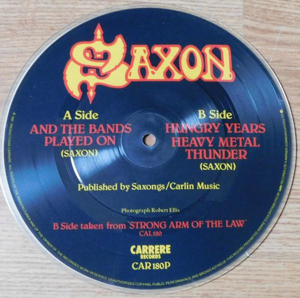 7-дюймовая пластинка SAXON - And The Bands Played On CAR180P Carrere 1981 UK Рок Б/У