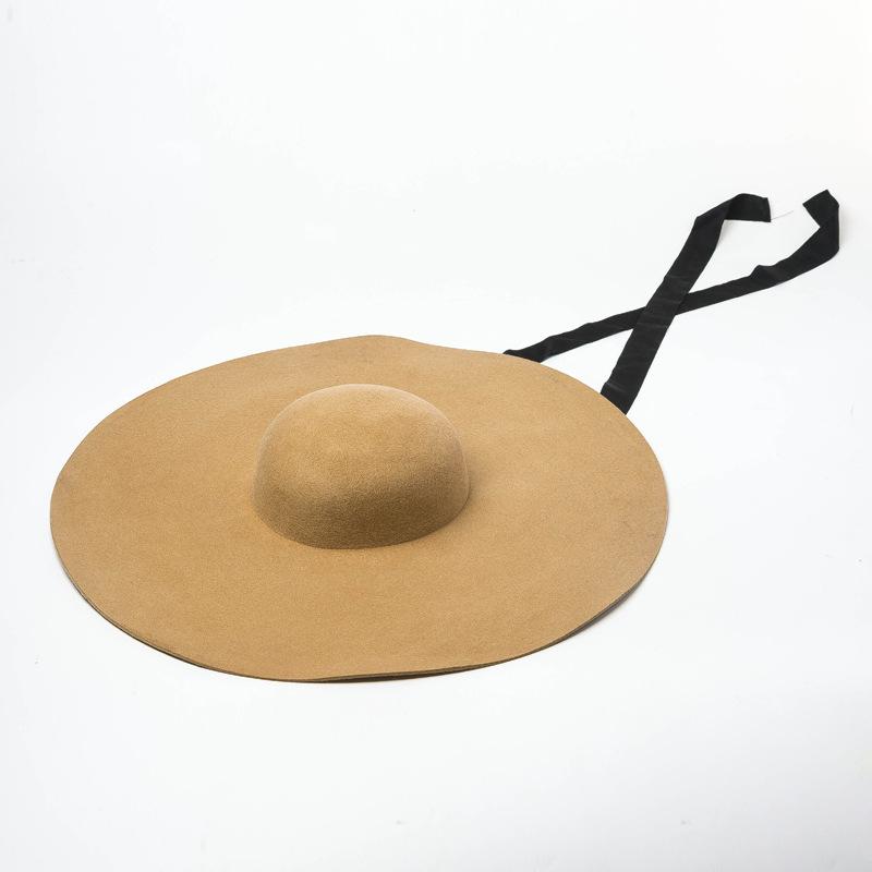 European and American autumn and winter new light dome strap wool woolen big-brimmed top hat stage catwalk concave big edge hat