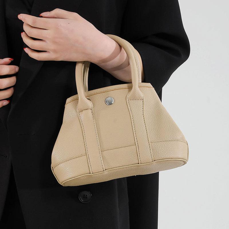 Solid color temperament lychee pattern portable small bag women's versatile senior sense business commuter style messenger bag