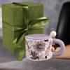 Elegant Ceramic Coffee Mug with Stirrer