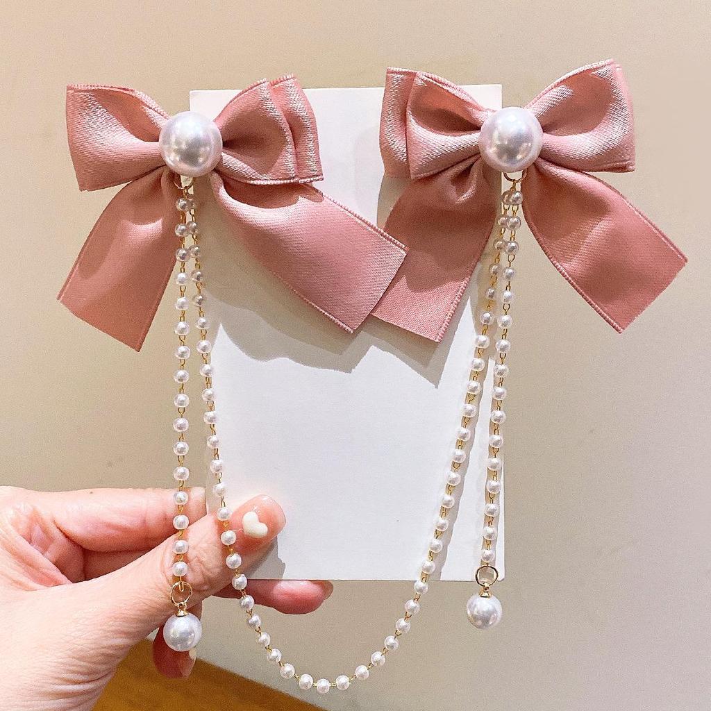 Красная новогодняя заколка-бантик с жемчужной кисточкой для девочек