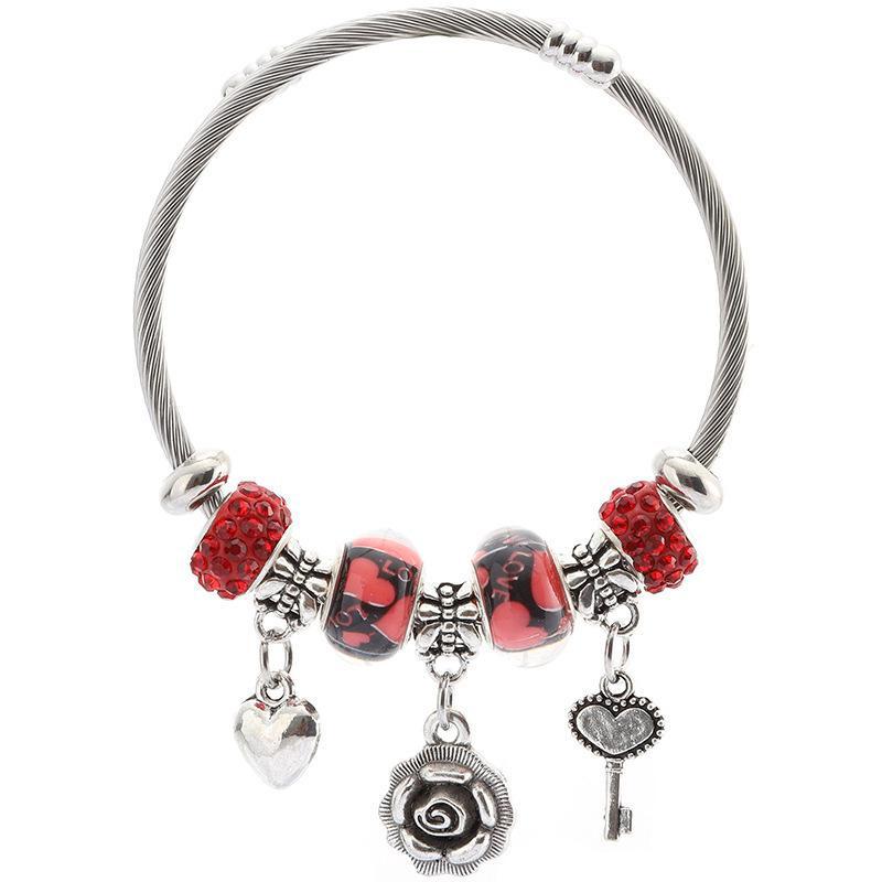 Стильный женский браслет из нержавеющей стали с шармами