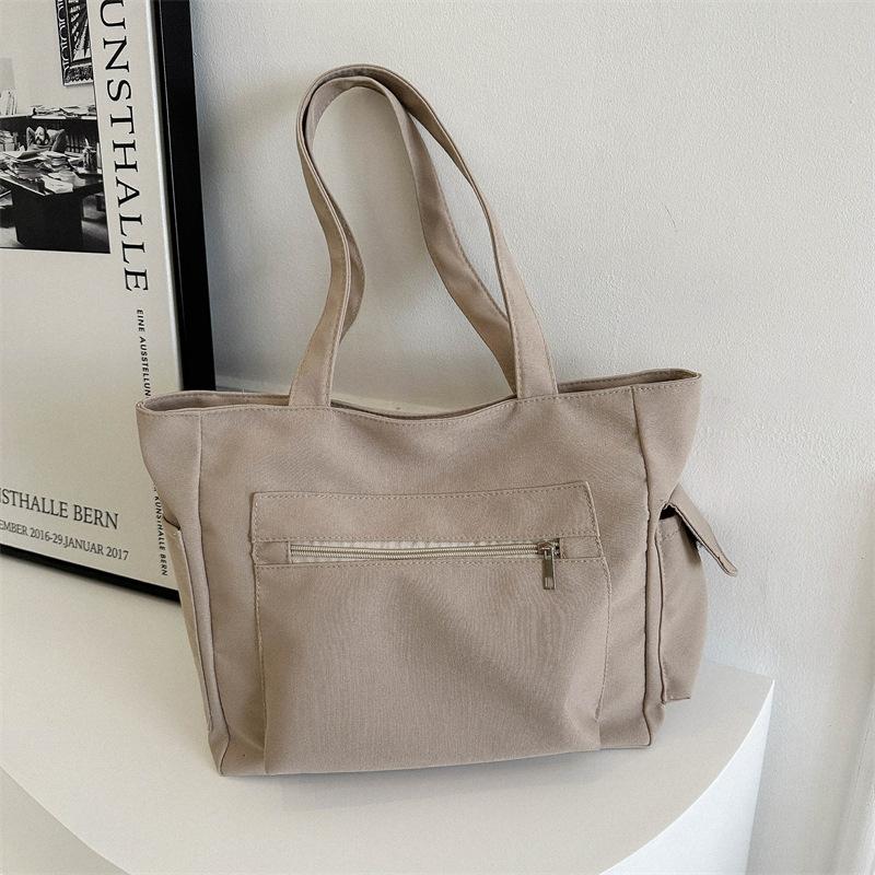 Корейская версия нишевого дизайна простая холщовая однотонная сумка женская сумка 2024 зимняя новая сумка большой вместимости через плечо подмышку