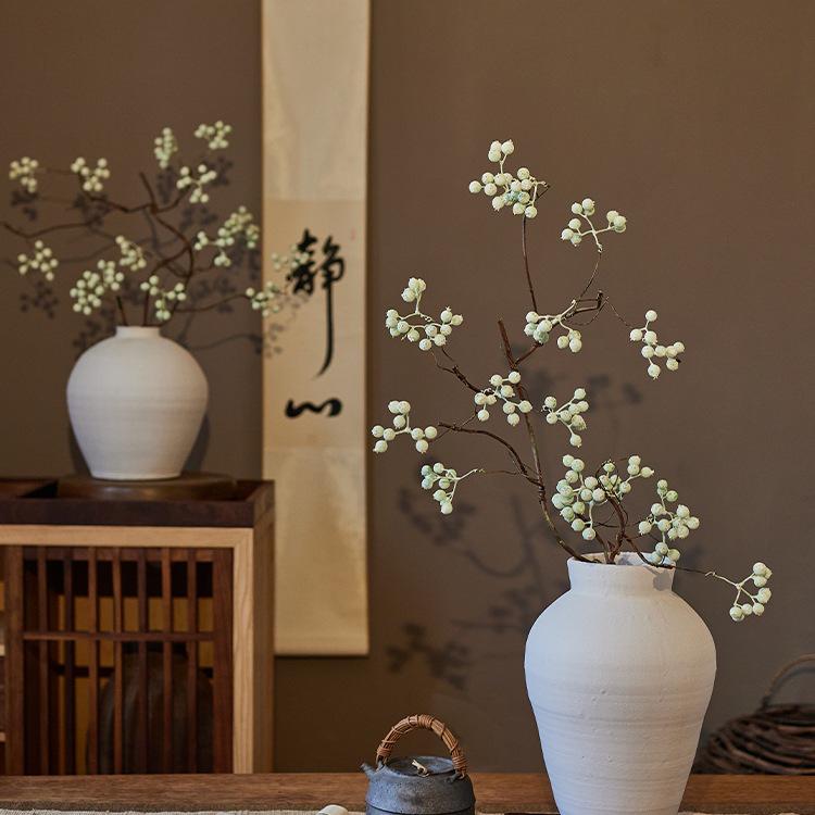 Высококлассное биомиметическое флористическое искусство в стиле ваби-саби: Букет из конского каштана и искусственных цветов для оформления гостиной.