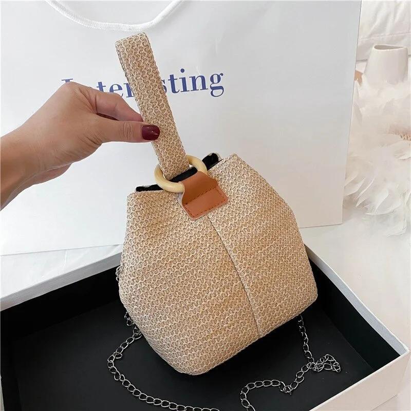 1 Pcs Women's Handheld One Shoulder Diagonal Straddle Bag Summer New Fashion Versatile PP Woven Chain Bucket Bag
