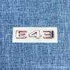 Applicable two-color hybrid car logo E63 E63S E43 E53 rear displacement labeling red and black label