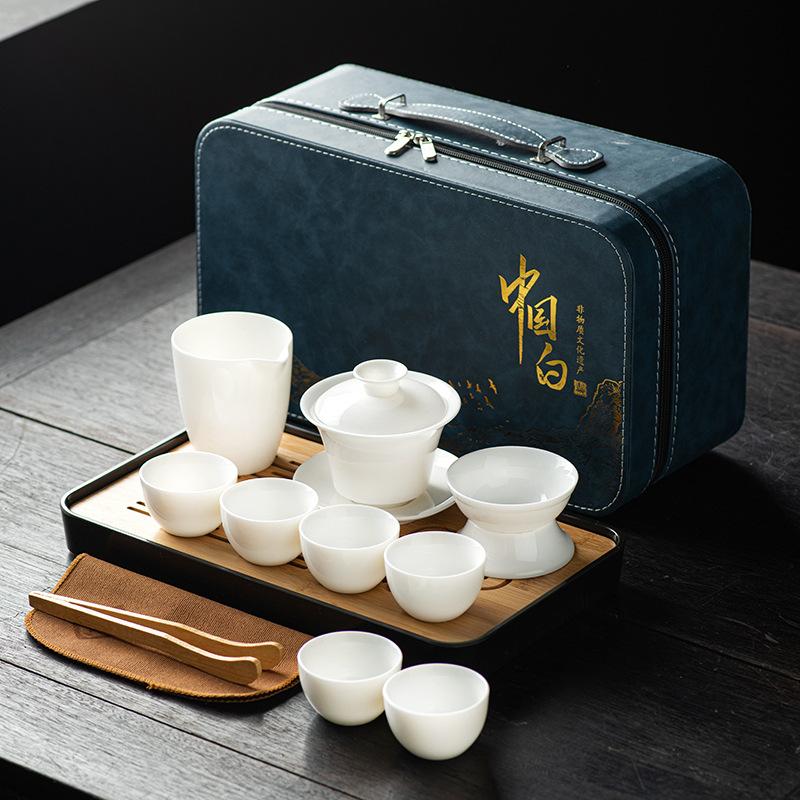 Suet jade white porcelain tea set, full set of kung fu tea set cover bowl tea cup travel tea set gift box print