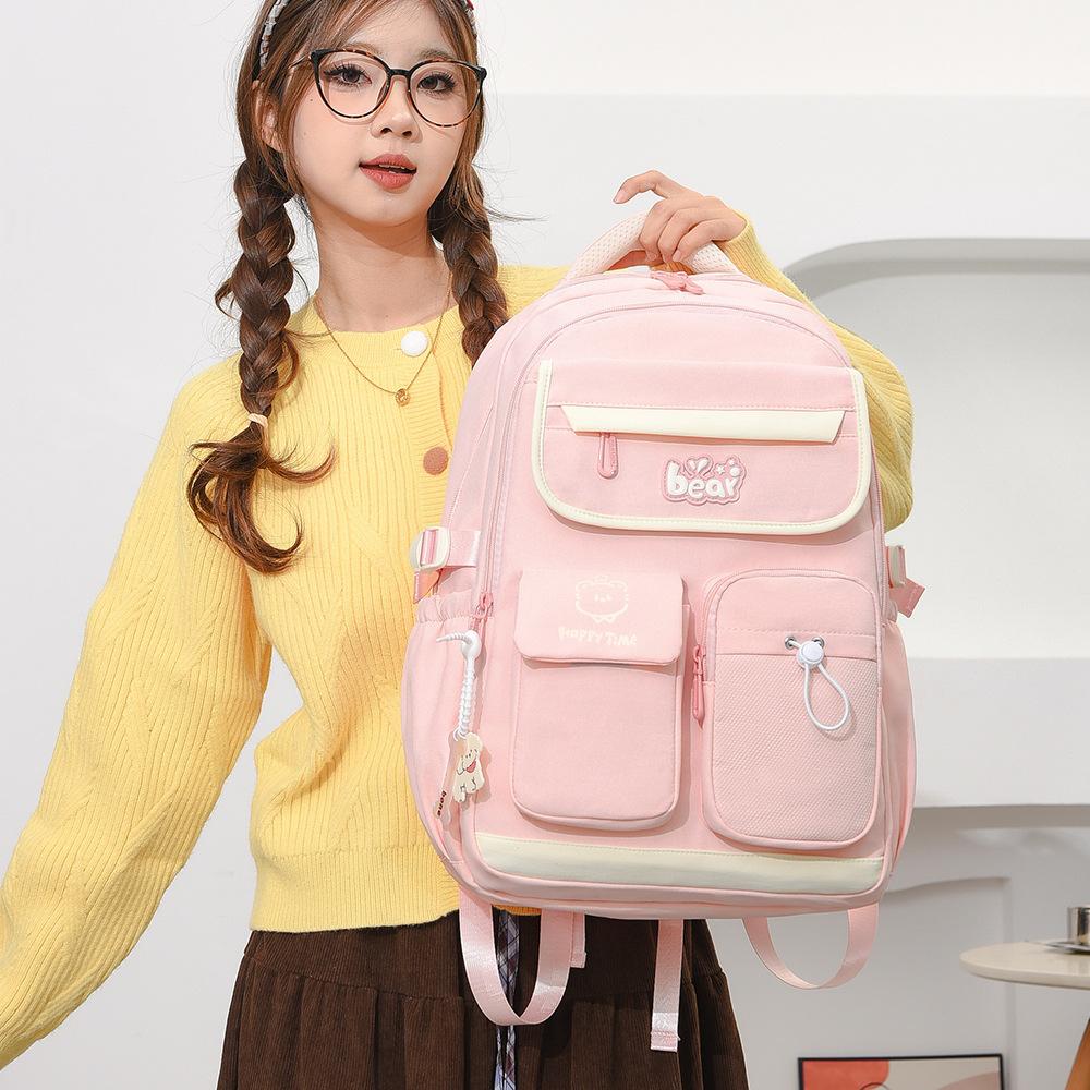 Schoolbag new schoolbag female junior high school high school large capacity high value student burden reduction light backpack college student