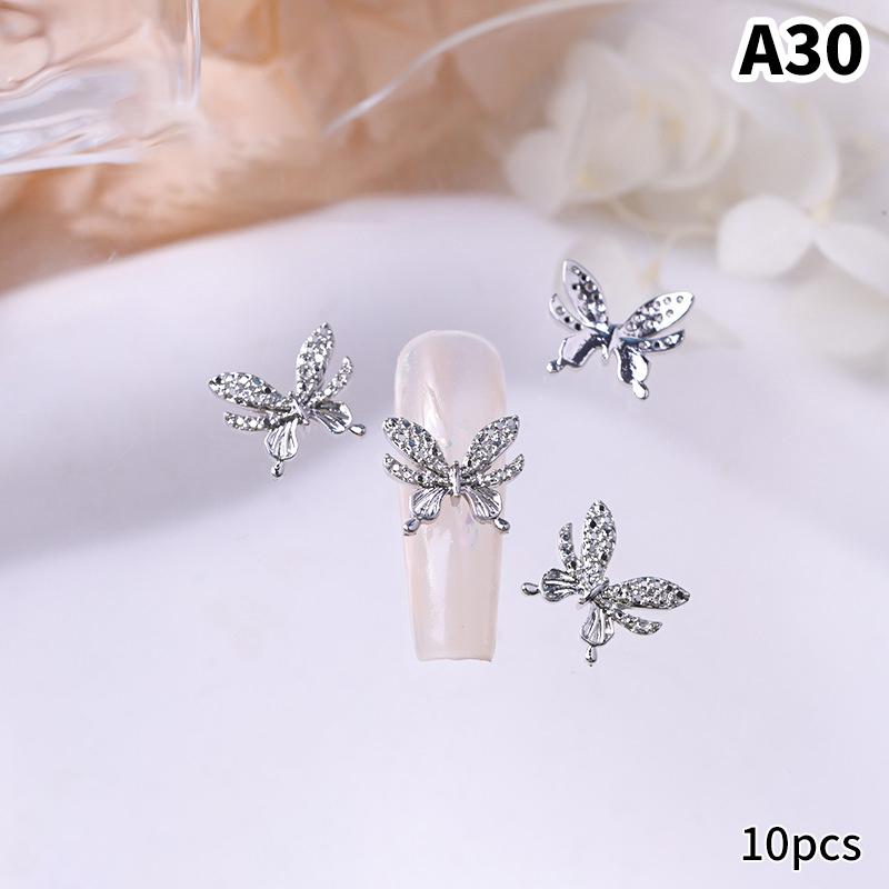 10 шт./пакет в форме бабочки, звезда, цветок, подвеска для ногтей, серебряный сплав для ногтей, жемчужные украшения, аксессуары, принадлежности для ногтей