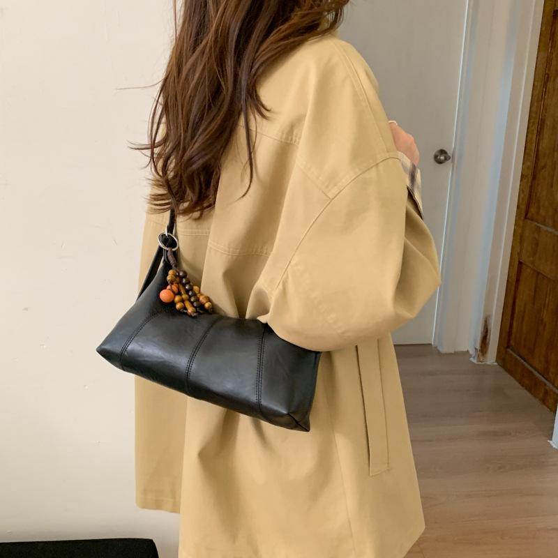 Сумка подмышку женская 2025 новая модная нишевый дизайн плечевая сумка женская популярная французская сумка-багет