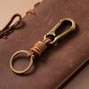 Retro Alloy Cowhide Keychain with Hand-Woven Belt - Men's Business Gift Key Ring for Car and Mountaineering Enthusiasts