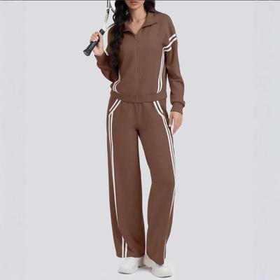 Женский спортивный костюм в стиле колор-блок Осень/Зима: Комплект из двух предметов: куртка на молнии и брюки широкого кроя для повседневной носки.