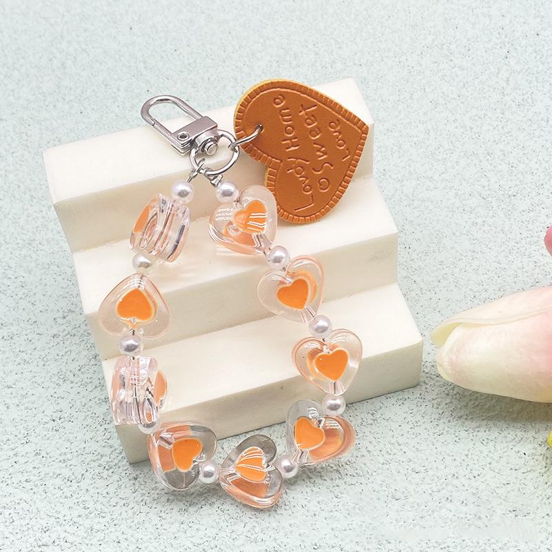 Браслет с хрустальным сердечком любви, защита от потери, чехол для мобильного телефона, ремешок на запястье, брелок для автомобиля, милый телефонный шарм