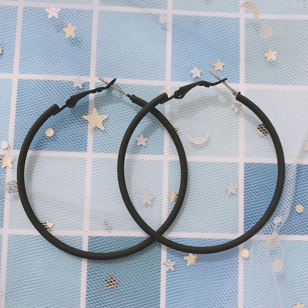 Женские большие серьги обручи