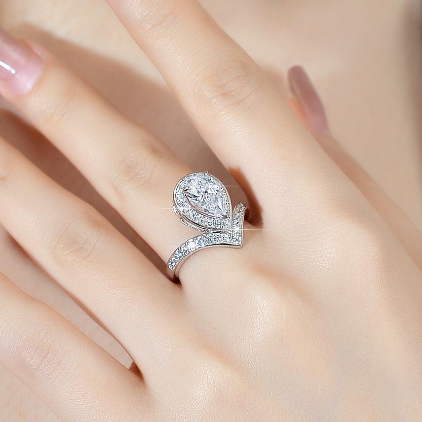 Elegant Women's S925 Silver Moissanite Ring with Irregular Pear-Shaped 2 Carat Diamond Design
