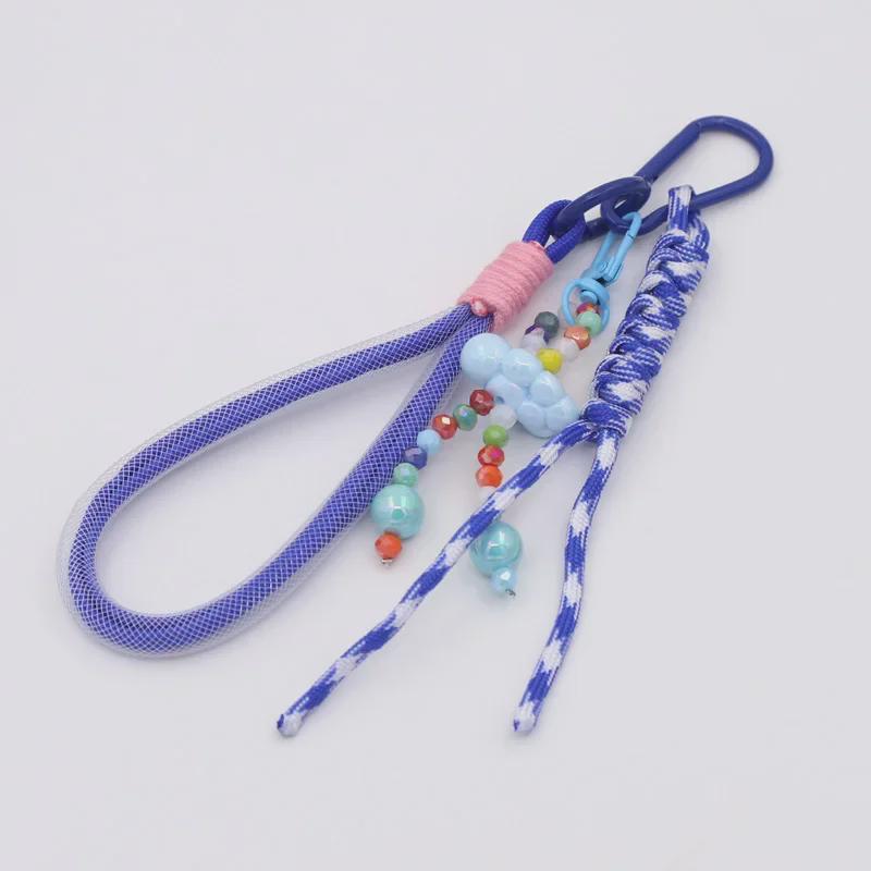 Подвеска-брелок ручной работы из бисера в стиле бохо