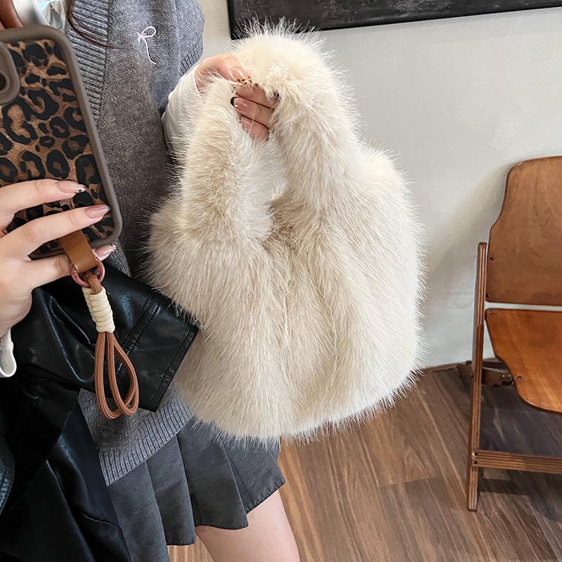 2025 new hair bag women's imitation fox hair pleated soft hand bag large capacity handbag plush bag