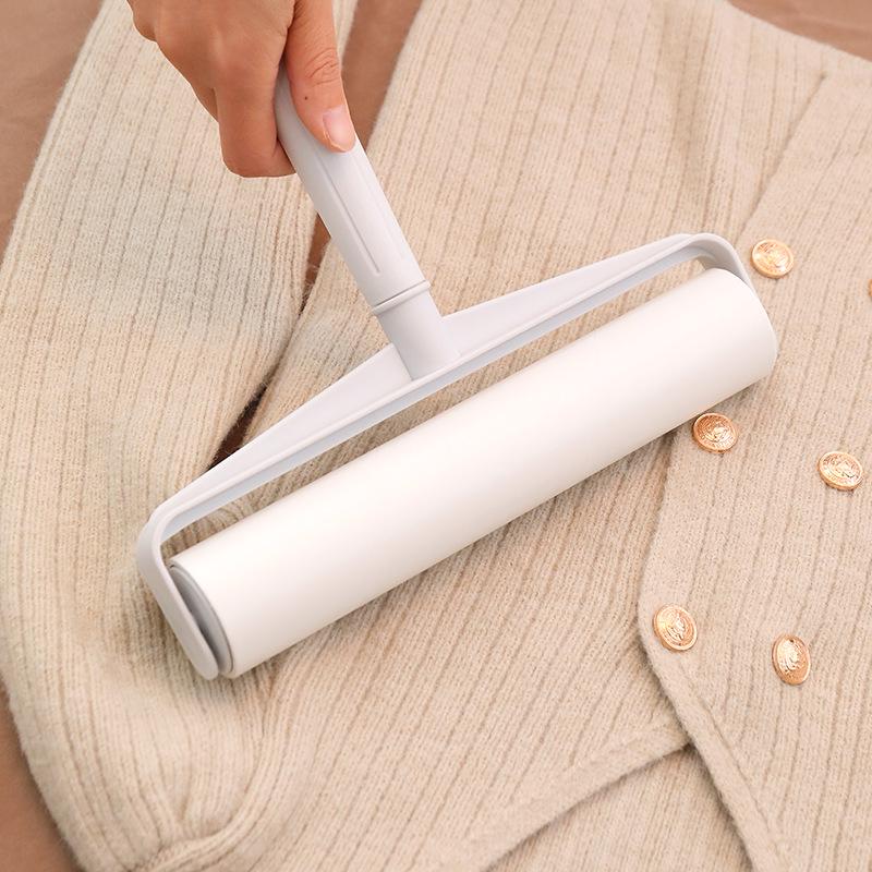 Long-Handle Lint Roller: Hair & Dust Removal Sticky Brush with Tearable Rolls for Floor and Bed.