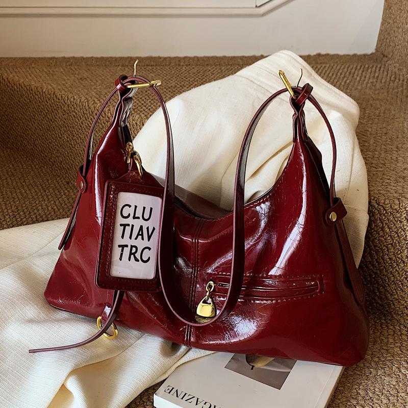 Ретро нишевая сумка подмышку женская 2025 новая трендовая корейская сумка-тоут простая вместительная сумка-мессенджер сумка для通勤