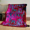 The pattern features colorful "LOVE" and "PEACE" text with peace symbols. for all seasons blanket lunch break throw gift